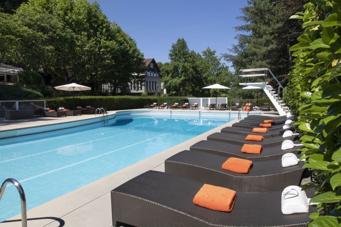 The outdoor pool at the Domaine de Divonne