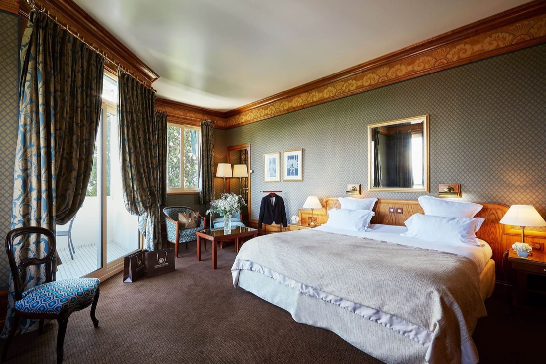 A guest room at Le Grand Hotel du Domaine de Divonne